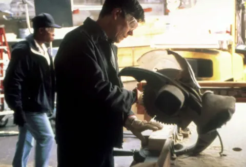 Кадр из фильма Дровосек