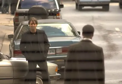 Кадр из фильма Гангстер