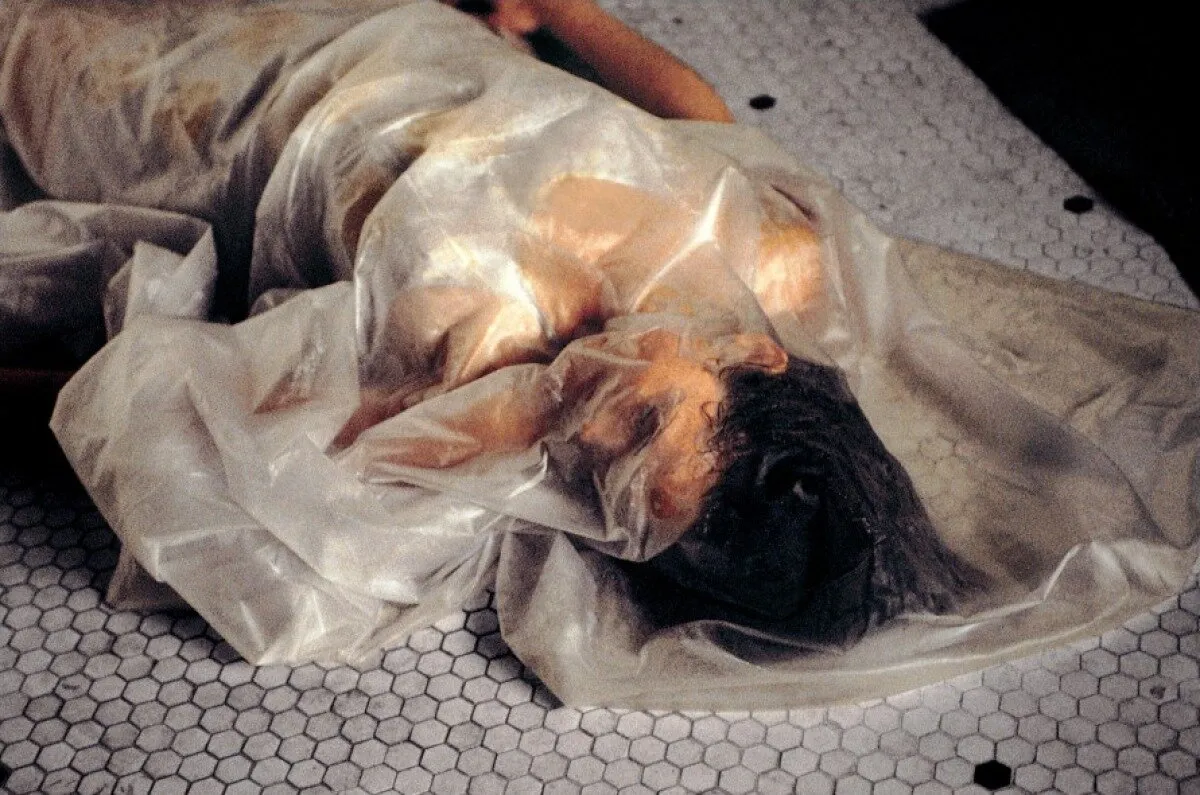 Кадр из фильма Мементо