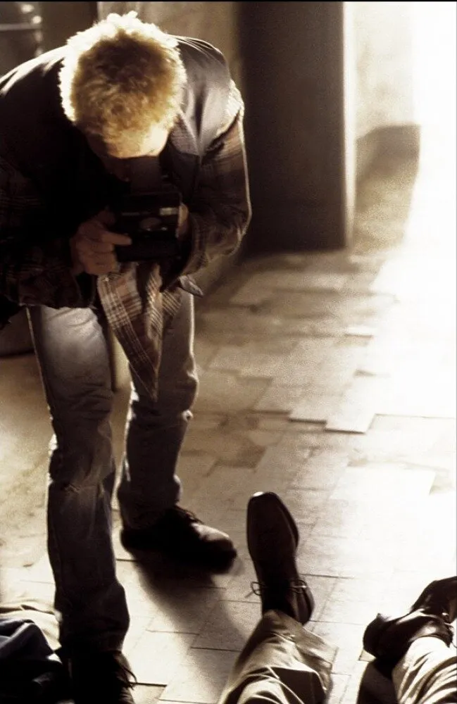 Кадр из фильма Мементо