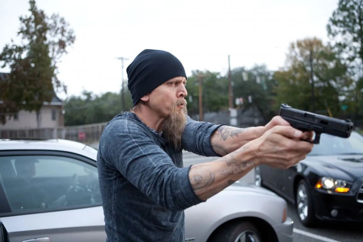 Кадр из фильма Стукач