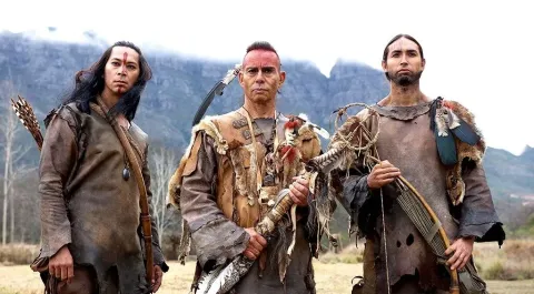 Кадр из фильма Святые и чужие